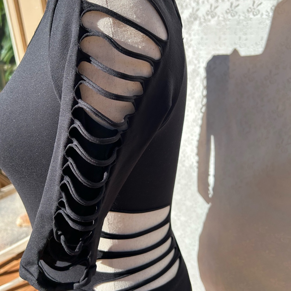 SEXY……CUT OUT BODYSUIT AND 3/4 LEGGINGS